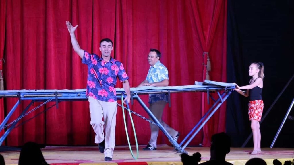 Posing on stage after finishing trampoline routine